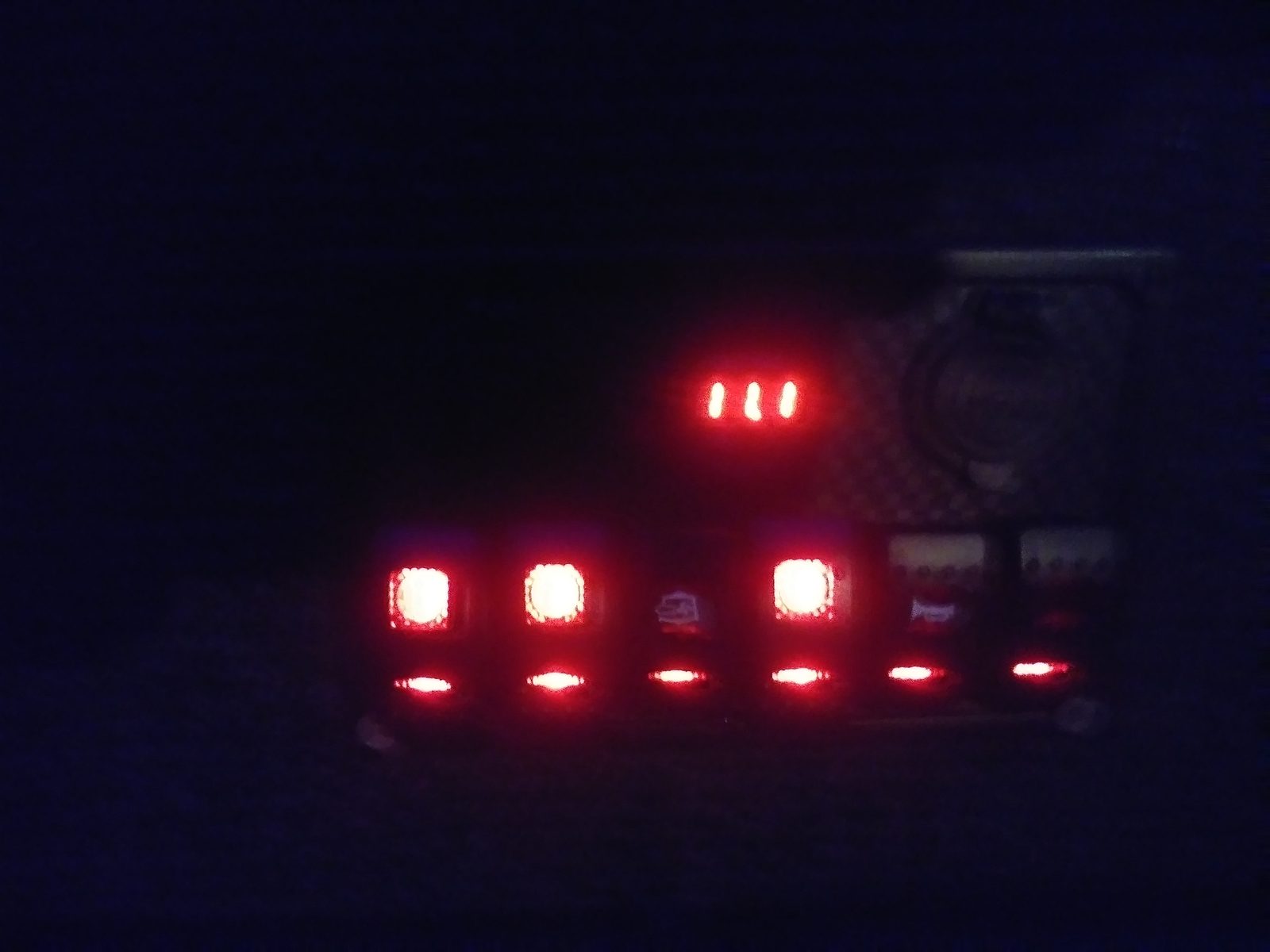 Close-up of the red LED light modules at night